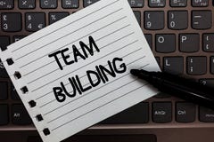 Text sign showing Team Building. Conceptual photo Types of activities used to enhance social relations Notebook piece paper keyboa stock photos Text sign showing Team Building. Conceptual photo Types of activities used to enhance social relations Notebook piece paper keyboa stock photos