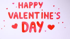 Texte heureux de jour du ` s de Valentine de beauté dessiné sur un fond blanc Texte heureux de jour du ` s de Valentine de beauté dessiné sur un fond blanc