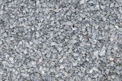 Textura de la miga del granito Superficie arenosa gris de la roca Granito blanco no pulido como fondo foto de archivo libre de regalías Textura de la miga del granito Superficie arenosa gris de la roca Granito blanco no pulido como fondo foto de archivo libre de regalías