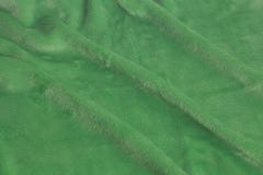 Textura verde do fundo da tela de veludo imagem de stock Textura verde do fundo da tela de veludo imagem de stock