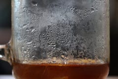 Texture abstract background of small drop of a liquid on the glass. stock image Texture abstract background of small drop of a liquid on the glass. stock image