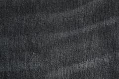 Texture of black jeans as background stock image Texture of black jeans as background stock image