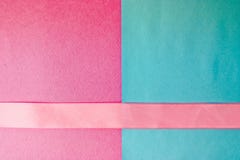 The texture of blue violet and beautiful modern paper with a pink ribbon of delicate fabric fashionable glamorous. The background royalty free stock image The texture of blue violet and beautiful modern paper with a pink ribbon of delicate fabric fashionable glamorous. The background royalty free stock image