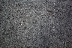 Texture de plan rapproché humide d'asphalte image libre de droits Texture de plan rapproché humide d'asphalte image libre de droits