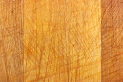 Texture of old wooden cutting board with scratches. Natural wood background Royalty Free Stock Photography Texture of old wooden cutting board with scratches. Natural wood background Royalty Free Stock Photography