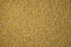 Texture écrasée de fond de gruaux de blé photographie stock Texture écrasée de fond de gruaux de blé photographie stock