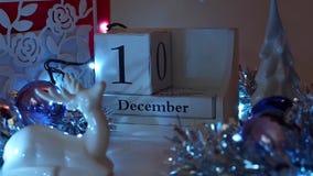 14th December Date Blocks Advent Calendar. Date calendar blocks turning during Christmas Advent set in a festive scene. Ideal to reveal days in December 14th December Date Blocks Advent Calendar. Date calendar blocks turning during Christmas Advent set in a festive scene. Ideal to reveal days in December