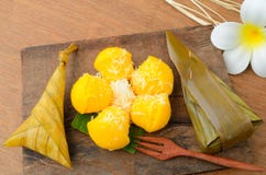 Thai Dessert Sticky Rice Wrapped In Banana Leaf And Toddy Palm Cake Or Kanom Tarn Royalty Free Stock Photography Thai Dessert Sticky Rice Wrapped In Banana Leaf And Toddy Palm Cake Or Kanom Tarn Royalty Free Stock Photography