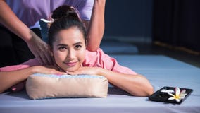 Thai massage to Asian female in spa stock photography Thai massage to Asian female in spa stock photography