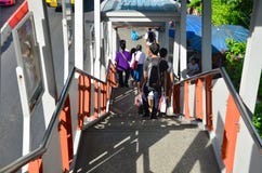 Thai people walking down the stairs of BTS station stock photos Thai people walking down the stairs of BTS station stock photos