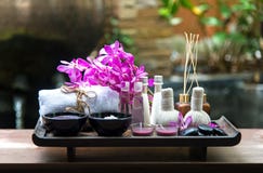 Thai Spa Treatments aroma therapy salt and sugar scrub and rock massage with orchid flower. Healthy Concept Stock Photo Thai Spa Treatments aroma therapy salt and sugar scrub and rock massage with orchid flower. Healthy Concept Stock Photo