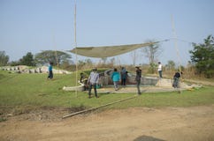 Thai worker prepare tent for people praying graveyard of Ancesto stock photography Thai worker prepare tent for people praying graveyard of Ancesto stock photography