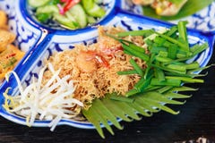 Thailand Street Food: Mi Krop, Traditional Thai Crispy Noodle Dish Made With Rice Noodles And Sweet Flavored Sauce, Served On Stock Image