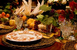 Thanksgiving Dinner. A background with a view of the beautiful arrangement of the table for Thanksgiving dinner Thanksgiving Dinner. A background with a view of the beautiful arrangement of the table for Thanksgiving dinner