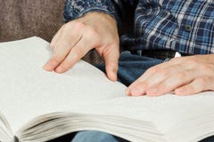 The Blind Man Was Reading A Book Written On Braille. Touch Your Royalty Free Stock Images The Blind Man Was Reading A Book Written On Braille. Touch Your Royalty Free Stock Images