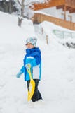 The Boy Goes For A Drive On An Snow Slope. Stock Photography The Boy Goes For A Drive On An Snow Slope. Stock Photography