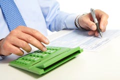 The Businessman And Green Calculator Royalty Free Stock Image
