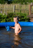 The Child In Inflatable Pool. Stock Photography