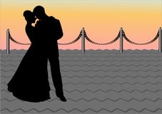 The In Love Pair On A Pier Stock Photos