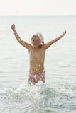 The Joyful Girl On Seacoast Royalty Free Stock Photography