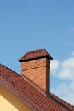 The Roof Of A Modern House With Brick Chimney Stock Photos