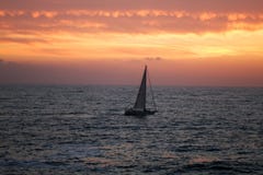 The Sea And Yacht On A Sunset Stock Photo The Sea And Yacht On A Sunset Stock Photo