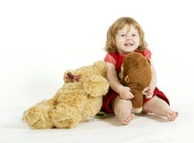 The Smiling Little Girl With Plush Toys. Stock Photography