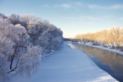 The Snow-covered River And Trees In Hoarfrost Royalty Free Stock Photos The Snow-covered River And Trees In Hoarfrost Royalty Free Stock Photos