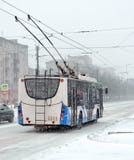 The Trolleybus In Snowfall Stock Images