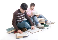 The Two Students With The Books Isolated Stock Photo