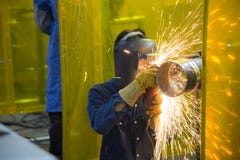 The Welding Craftsman Grinding The Steel Tube Stock Image