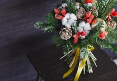 The Winter Bouquet Made Of Fir Branches, Christmas Balls And Dried Flowers Royalty Free Stock Photography