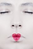 The Woman`s Face Close-up With Lips Painted In The Shape Of Hear Royalty Free Stock Photography
