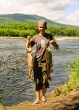 The Young Woman With The Fish Stock Images The Young Woman With The Fish Stock Images