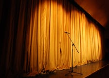 Theater Stage With Microphone Stock Images