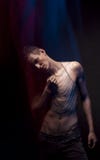 Theatrical Style. Silhouette of Graceful Handsome Thin Young Man Stock Photo Theatrical Style. Silhouette of Graceful Handsome Thin Young Man Stock Photo