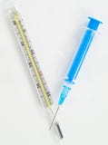 Thermometer And Syringe Stock Photography