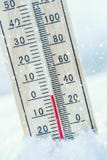 Thermometer on snow shows low temperatures zero. Low temperature royalty free stock photo Thermometer on snow shows low temperatures zero. Low temperature royalty free stock photo