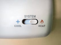 Thermostat cool heat switch