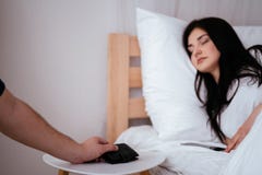 Thief stealing valet breaking into a bedroom stock photo Thief stealing valet breaking into a bedroom stock photo