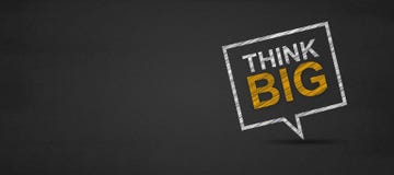 Think big and speech bubble on a blackboard royalty free stock photo Think big and speech bubble on a blackboard royalty free stock photo