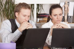 Thinking Office Workers Stock Photo