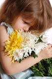 Thoughtful Girl With Flowers Stock Photo