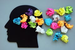 Thoughts, ideas and mindfulness concept. Head and paper balls