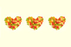 Thre sweet hearts made of colorful delicious candied fruits stock photos Thre sweet hearts made of colorful delicious candied fruits stock photos
