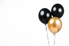 Three balloons, black and gold, isolate on a white background with place for text
