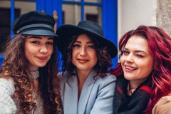 Three beautiful women taking selfie on city street. Friends hanging and having fun royalty free stock photos Three beautiful women taking selfie on city street. Friends hanging and having fun royalty free stock photos
