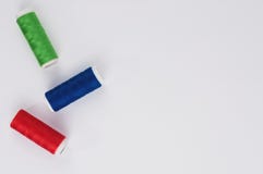 Three bobbin of new colorful thread royalty free stock images Three bobbin of new colorful thread royalty free stock images