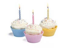 Three Cupcakes With Candle Royalty Free Stock Image