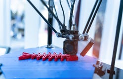 three dimensional 3D printer machine printing plastic model of fish skeleton